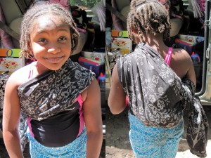 Kiki wearing the food and water in my fancy new ring sling. 