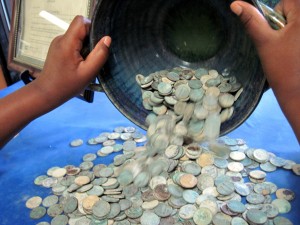 This is some of the money gathered from the rainbow wishing well pool inside the caves. There was over $3000 in all at the time visitors were no longer allowed to throw money into it, but much was too decayed from the mineral water to turn in to the bank.